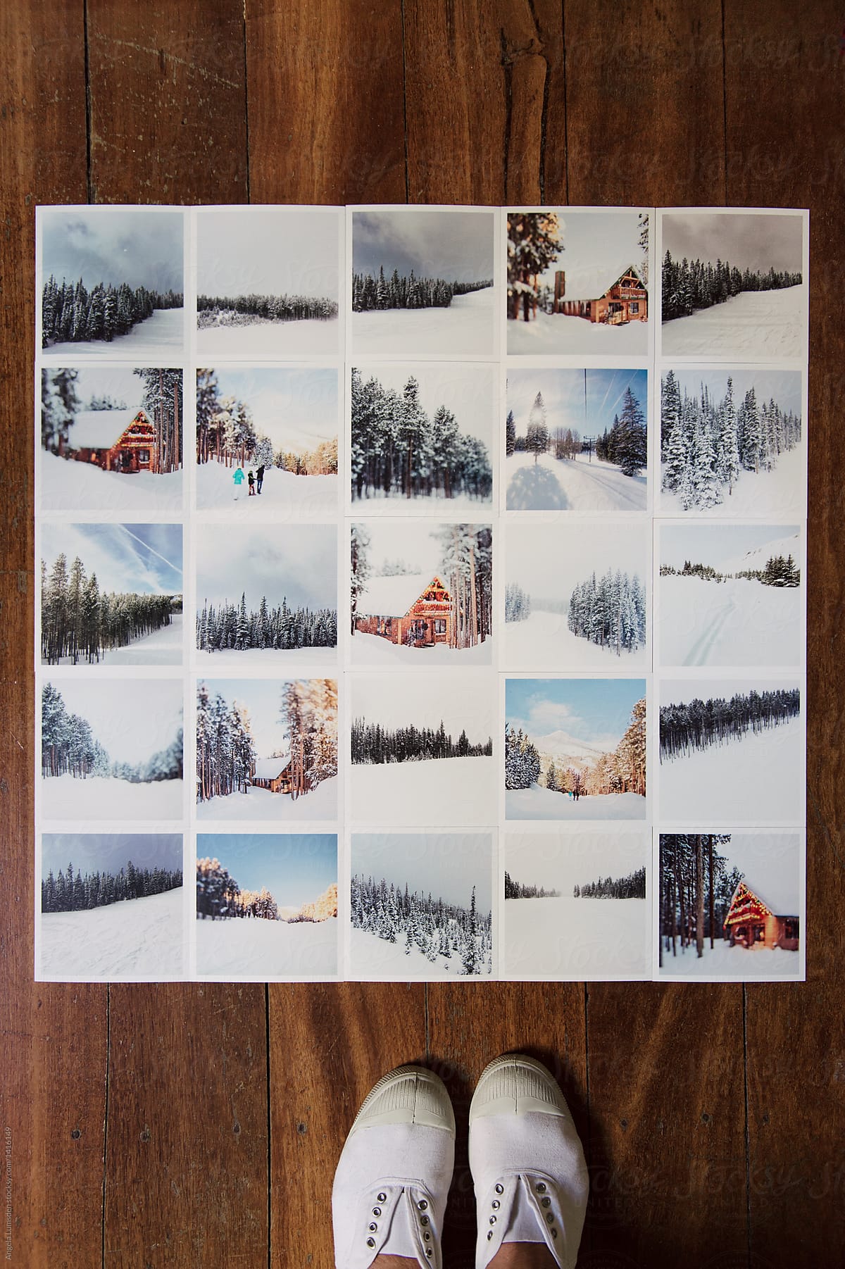 Photo prints laid out in a grid for framing