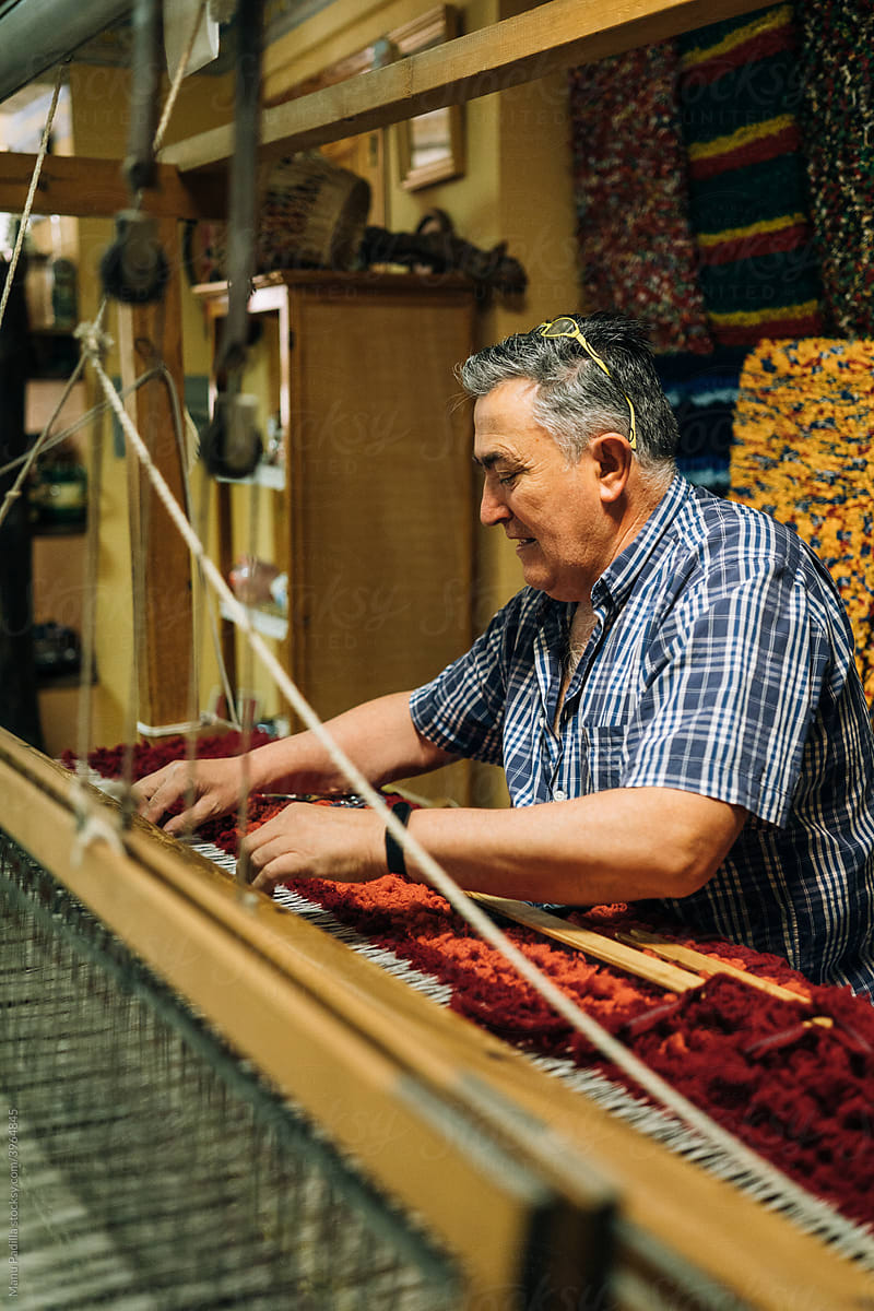 A Craftsman Finishes a Tapestry