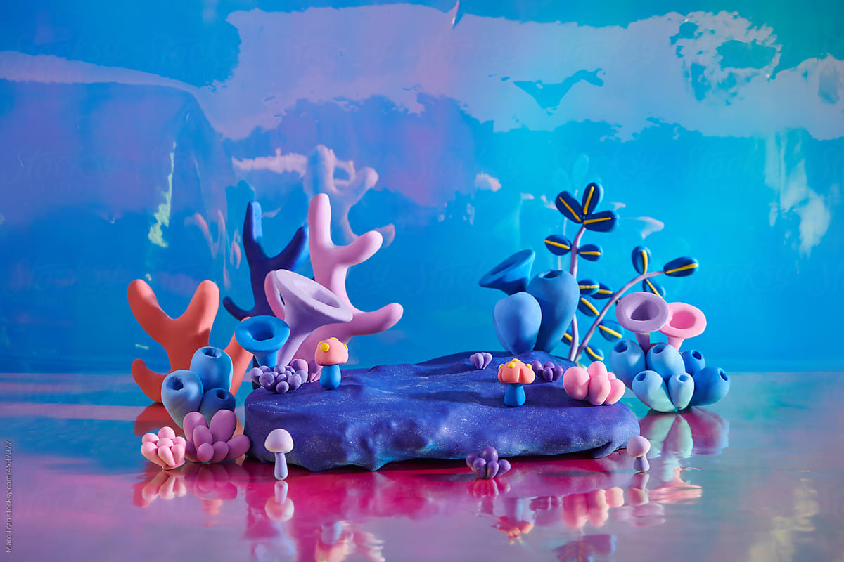 Underwater world with coral reefs and from colored plasticine