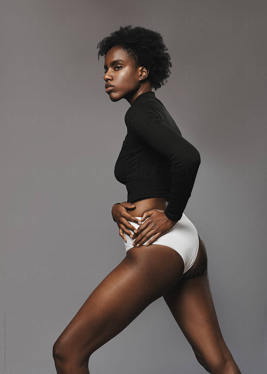 Young black model posing in photo studio