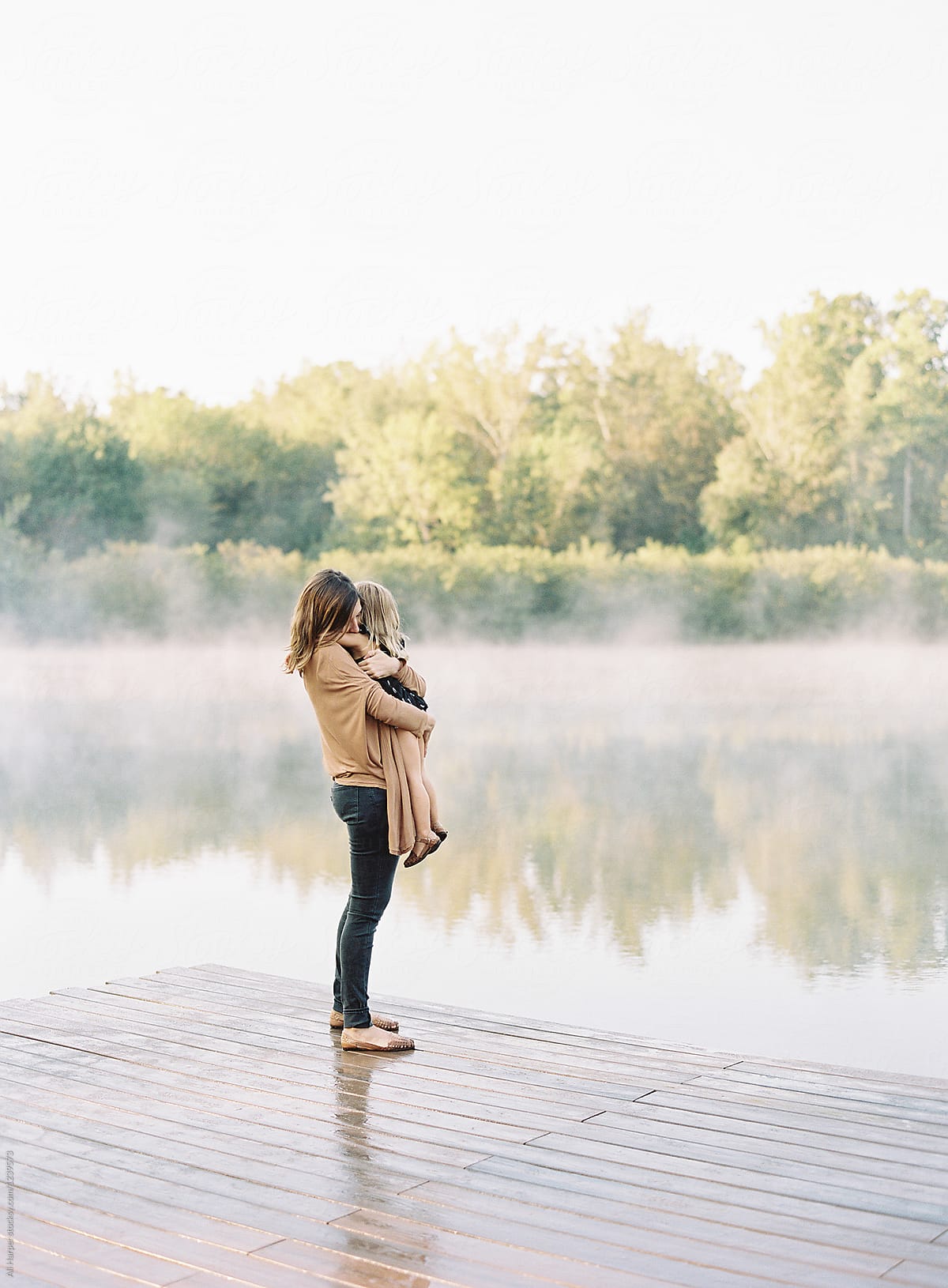 Mother And Daughter Embracing By Stocksy Contributor Ali Harper Stocksy 