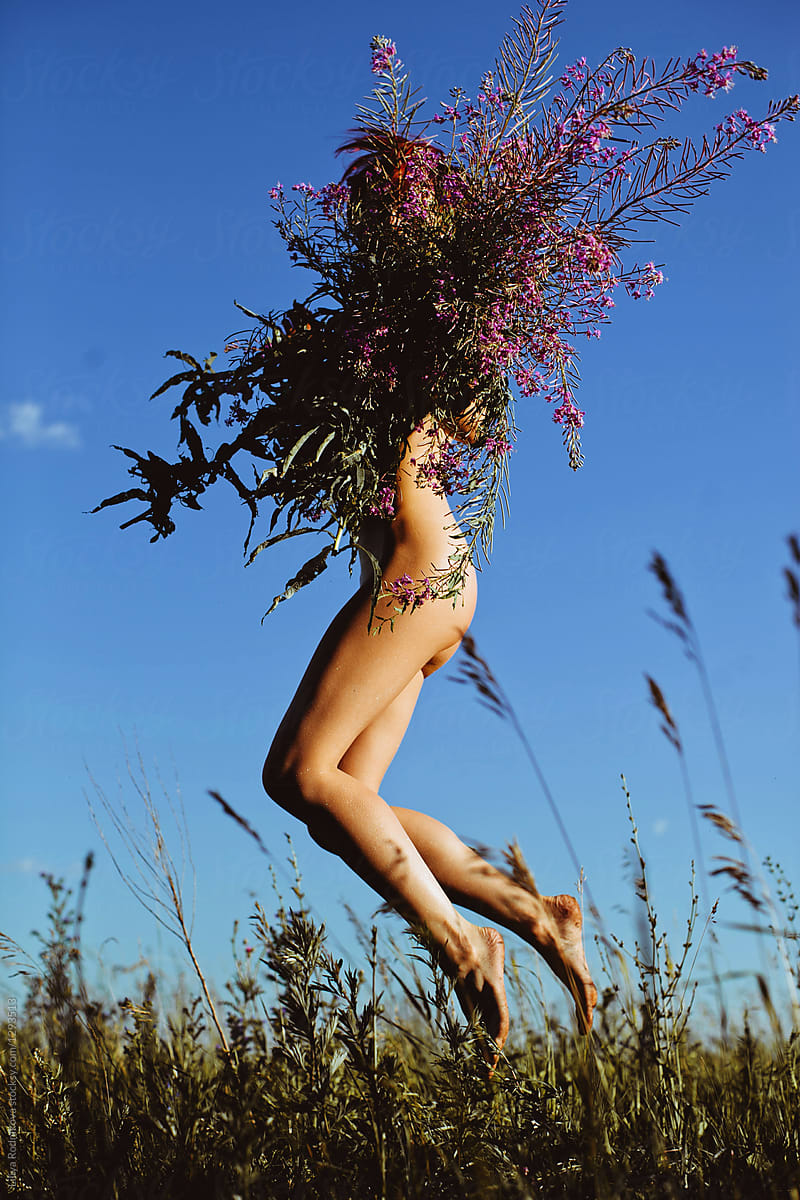 Naked Female With Big Bouquet Of Wild Flowers By Stocksy Contributor Liliya Rodnikova Stocksy