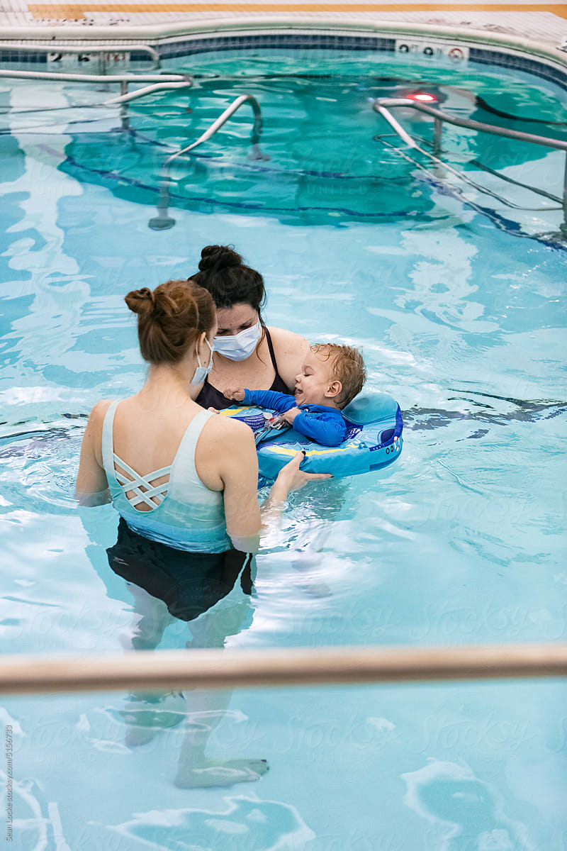 Boy With Cerebral Palsy At Pool Therapy