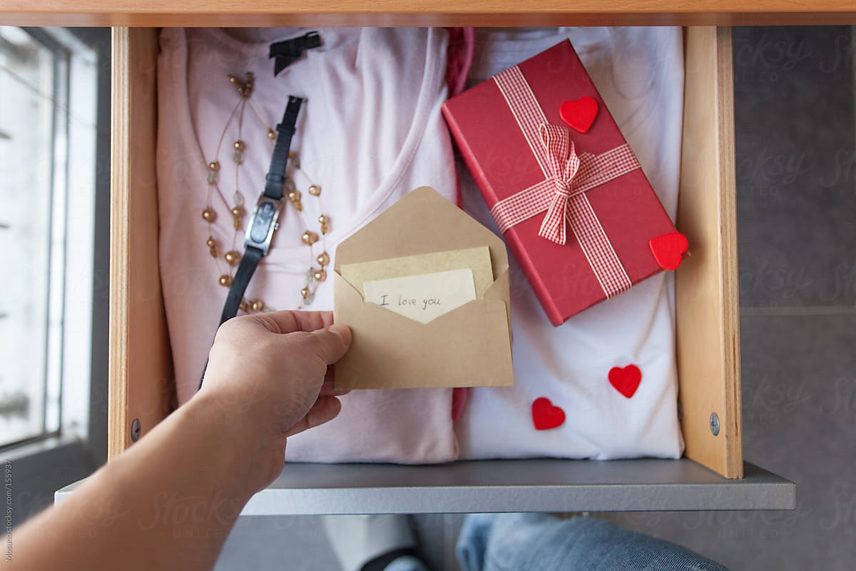 Woman Looking at Valentine\'s Surprise in Her Drawer