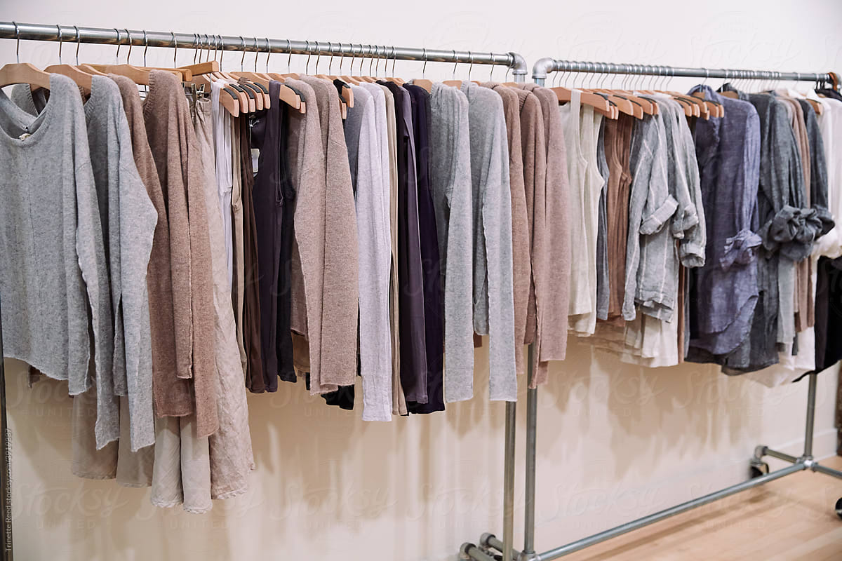 Linen and cashmere clothing on rack