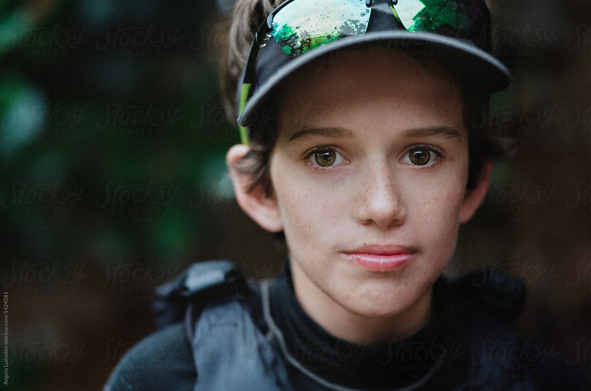 Close up portrait of a boy with freckles after sailing