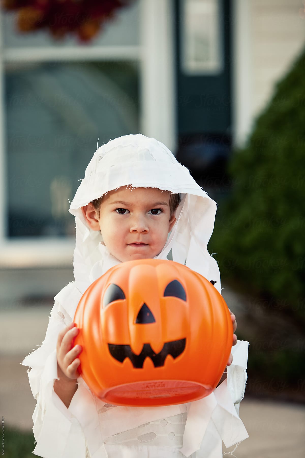Halloween: Little Boy With Candy Bucket