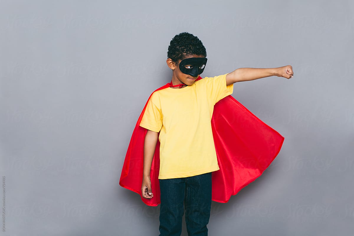 Little boy with Superhero costume.