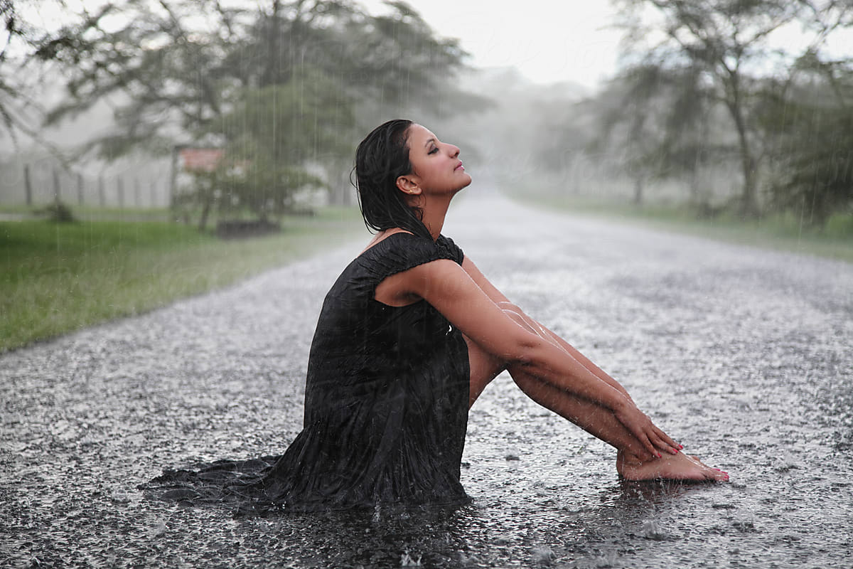 Woman Enjoying the rain