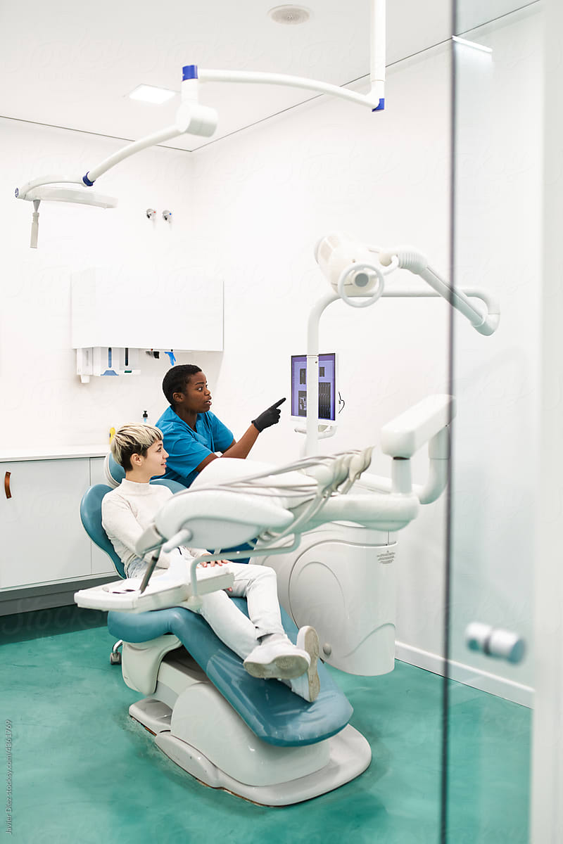 Dentist examining teeth scans