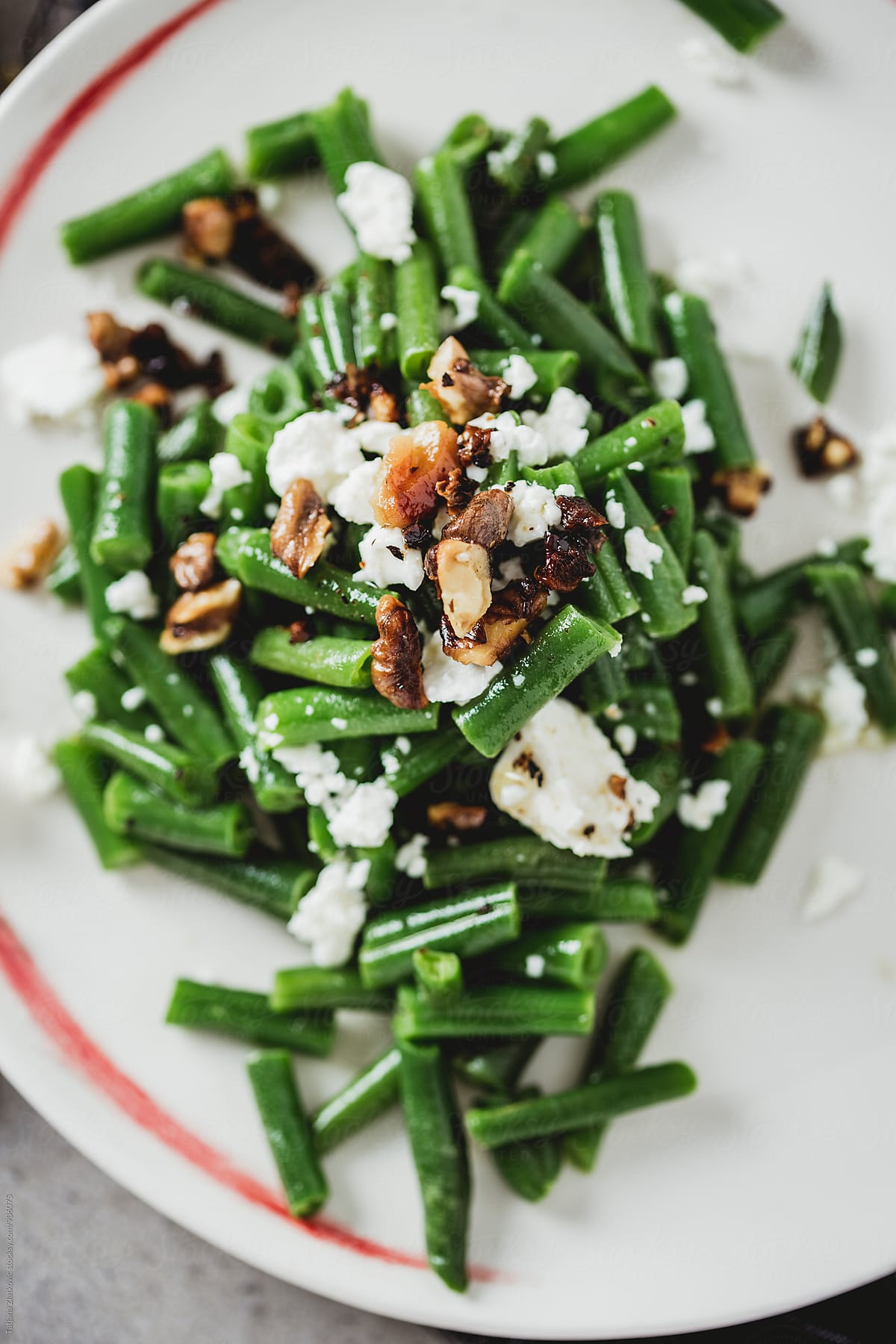 Green beans with goat cheese and walnuts