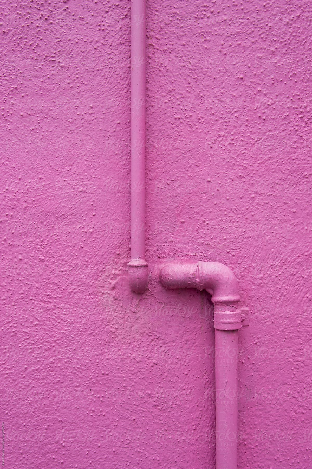 Pink pipe on Pink wall in Burano, Italy