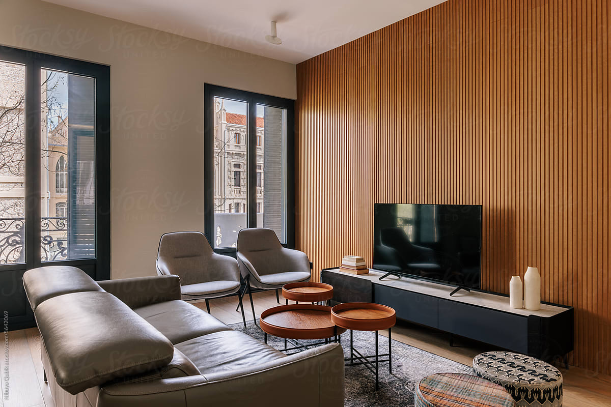 Luxury living room with wood slat wall