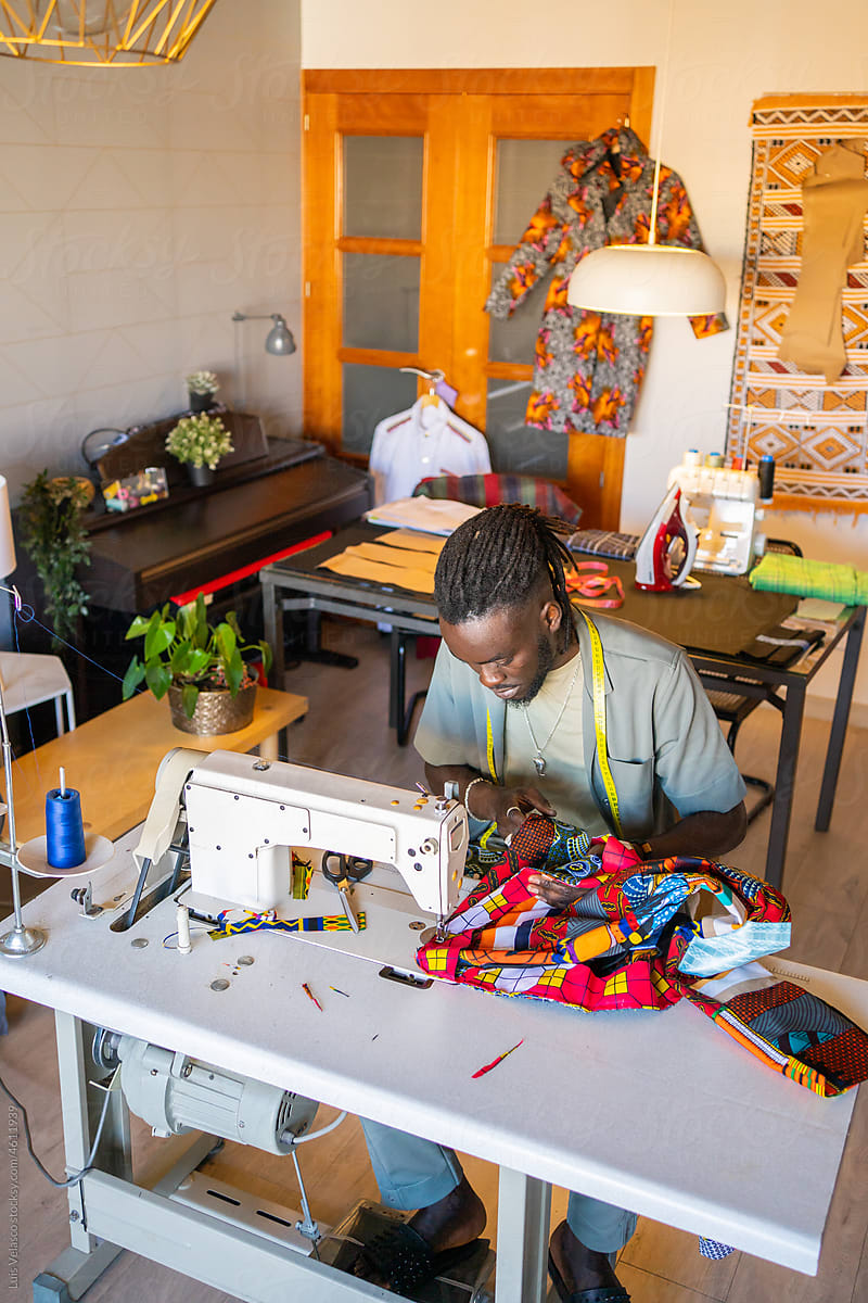Black Man Entrepreneur Working In A Fashion Design Studio.