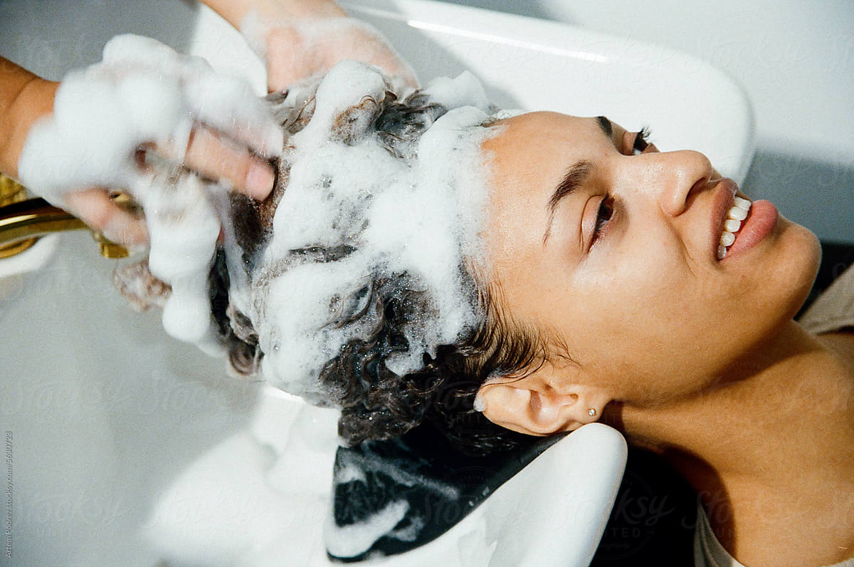 Professional Hair Washing at Beauty Salon. Film photo