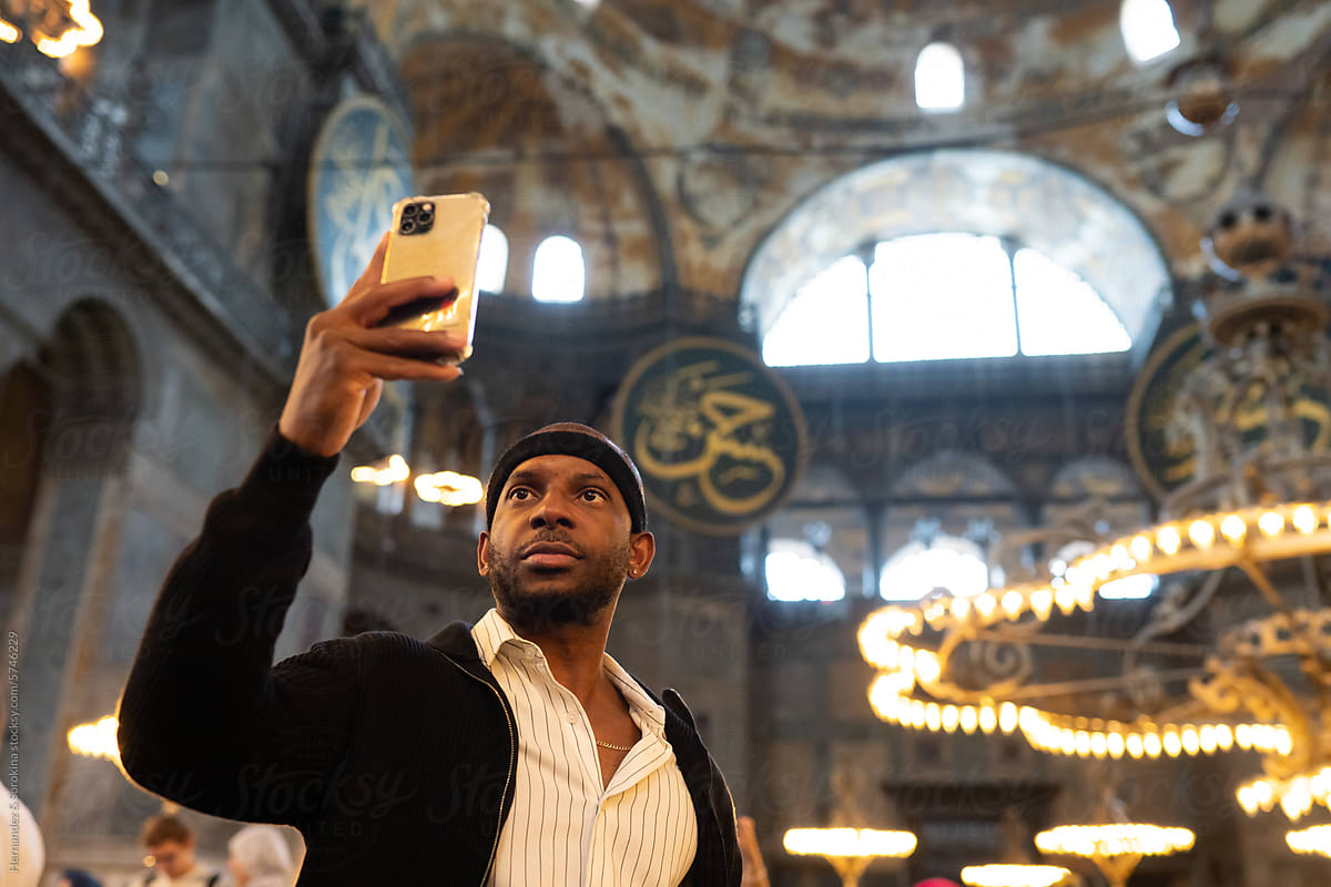 Man After Hair Transplant Taking Selfie In Blue Mosque