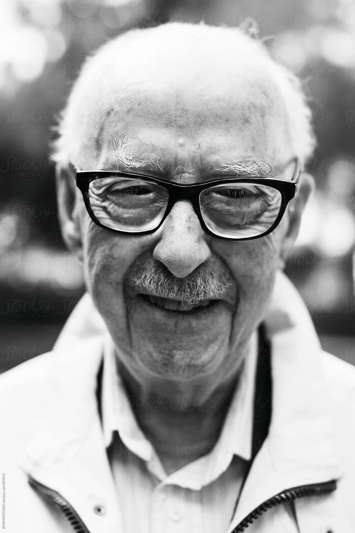 Portrait of an elderly man. Black and white photo.
