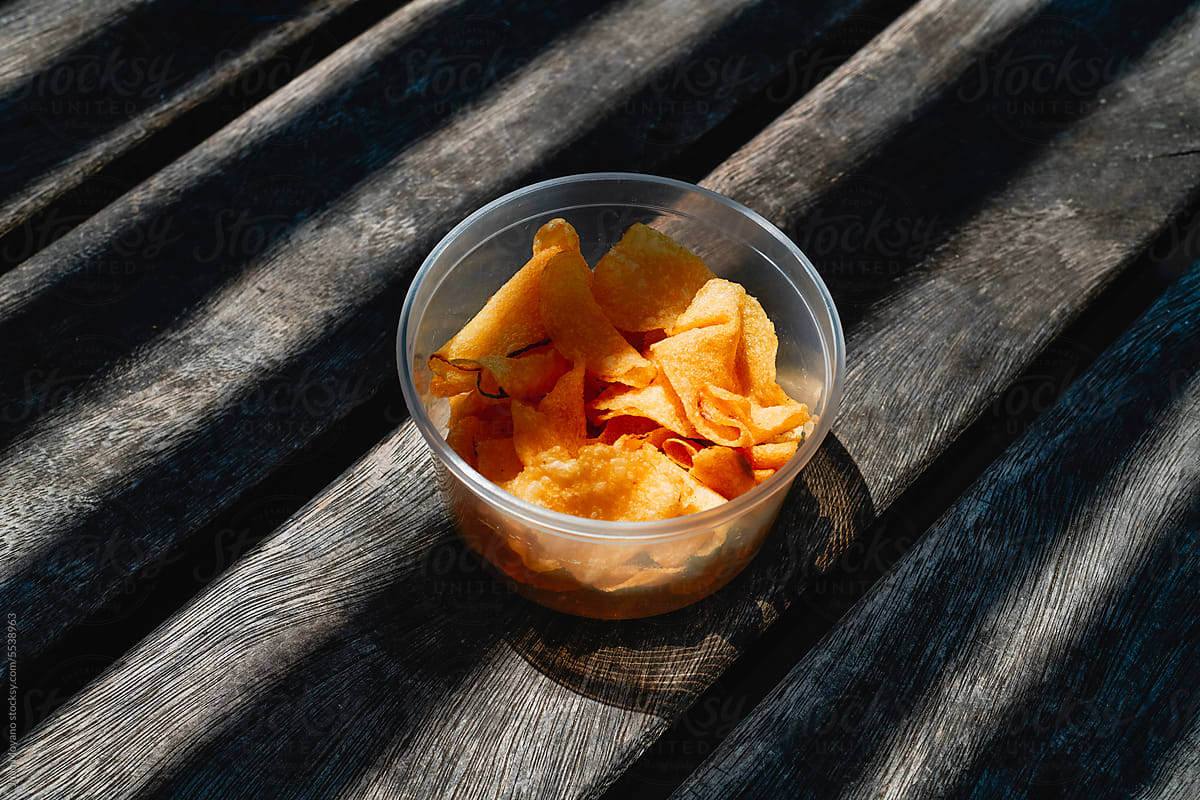 potato chips in a plastic container