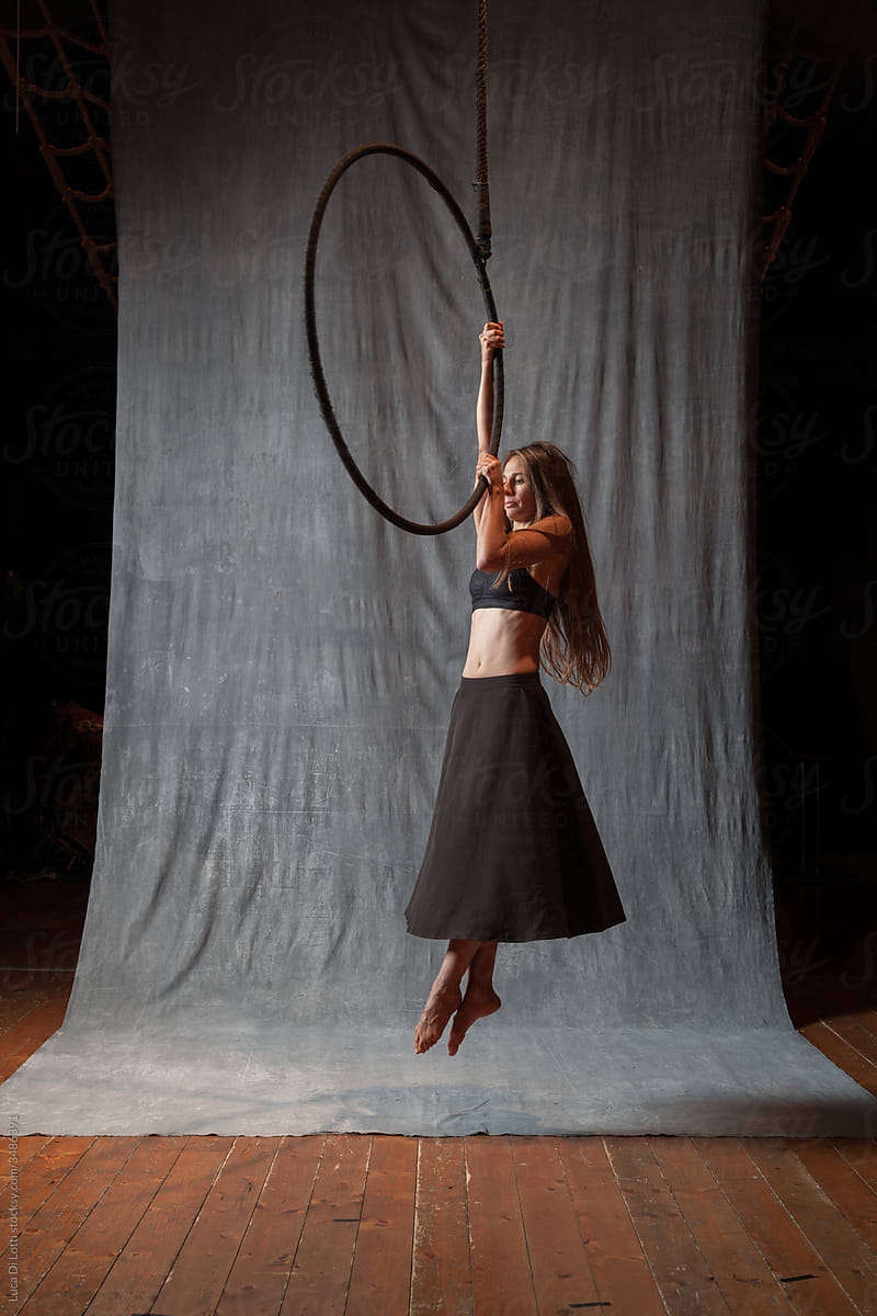 Aerial artis suspended on a Lyra or Aerial hoop