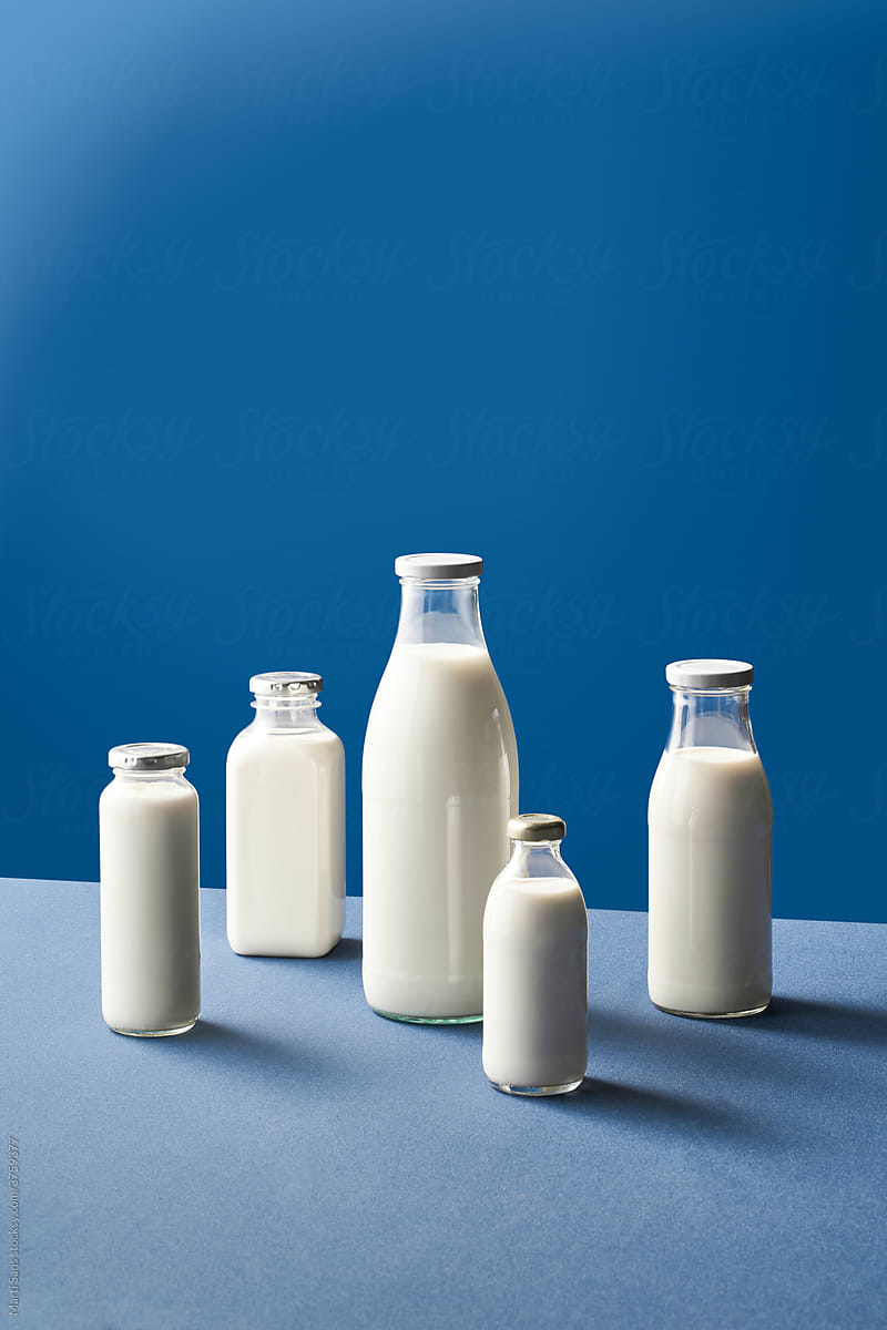 Composition Of Glass Milk Bottles by Stocksy Contributor Martí Sans -  Stocksy
