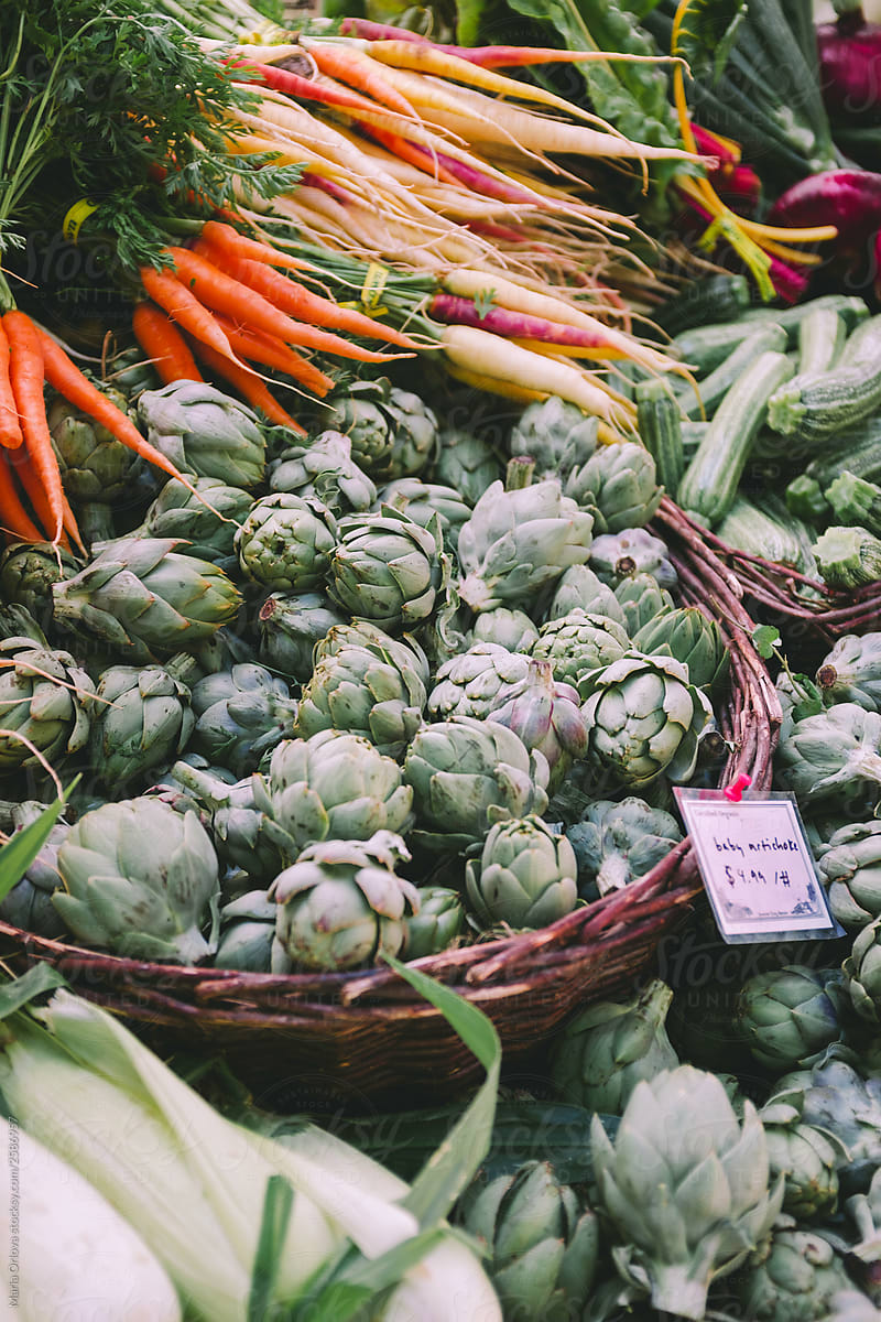 Farmers market stand with artichokes