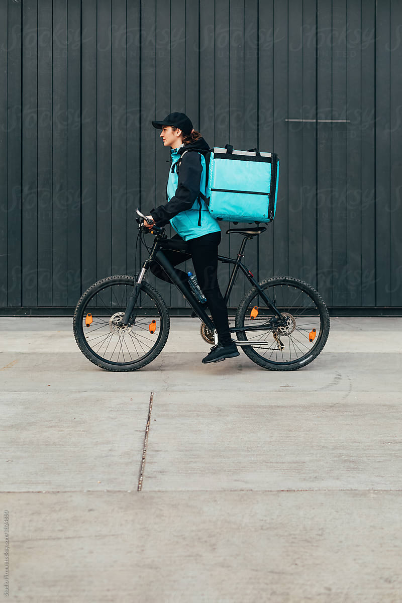 Delivery Woman on Bicycle