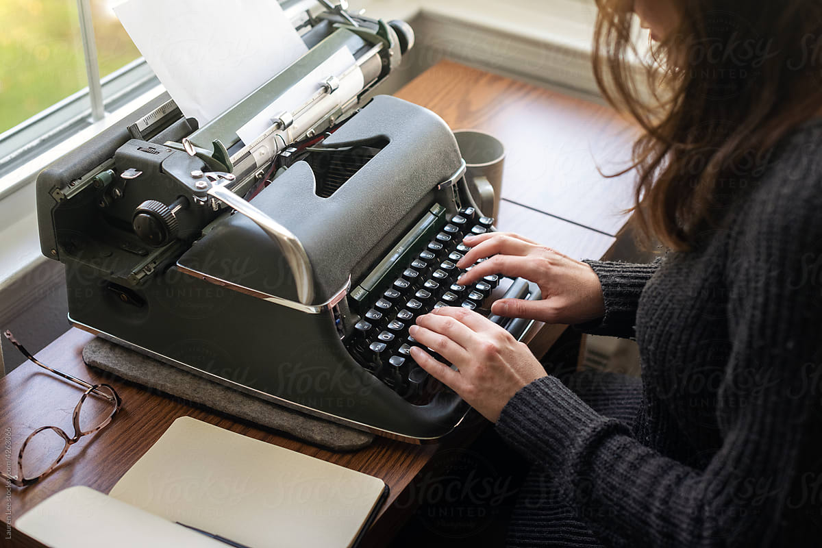 Little Kid Typing On Typewriter by Stocksy Contributor Lauren Lee -  Stocksy