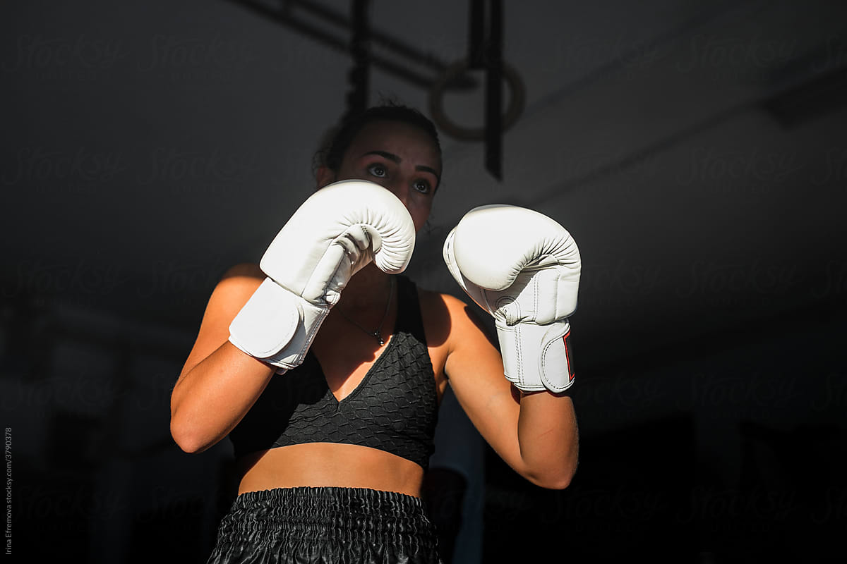 Female Kick-Boxing Athlete Guarding Up