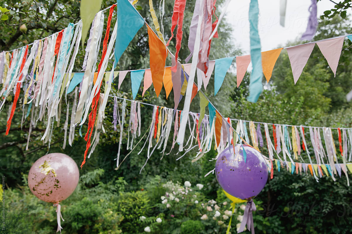 Fabric flags and ribbons in the garden