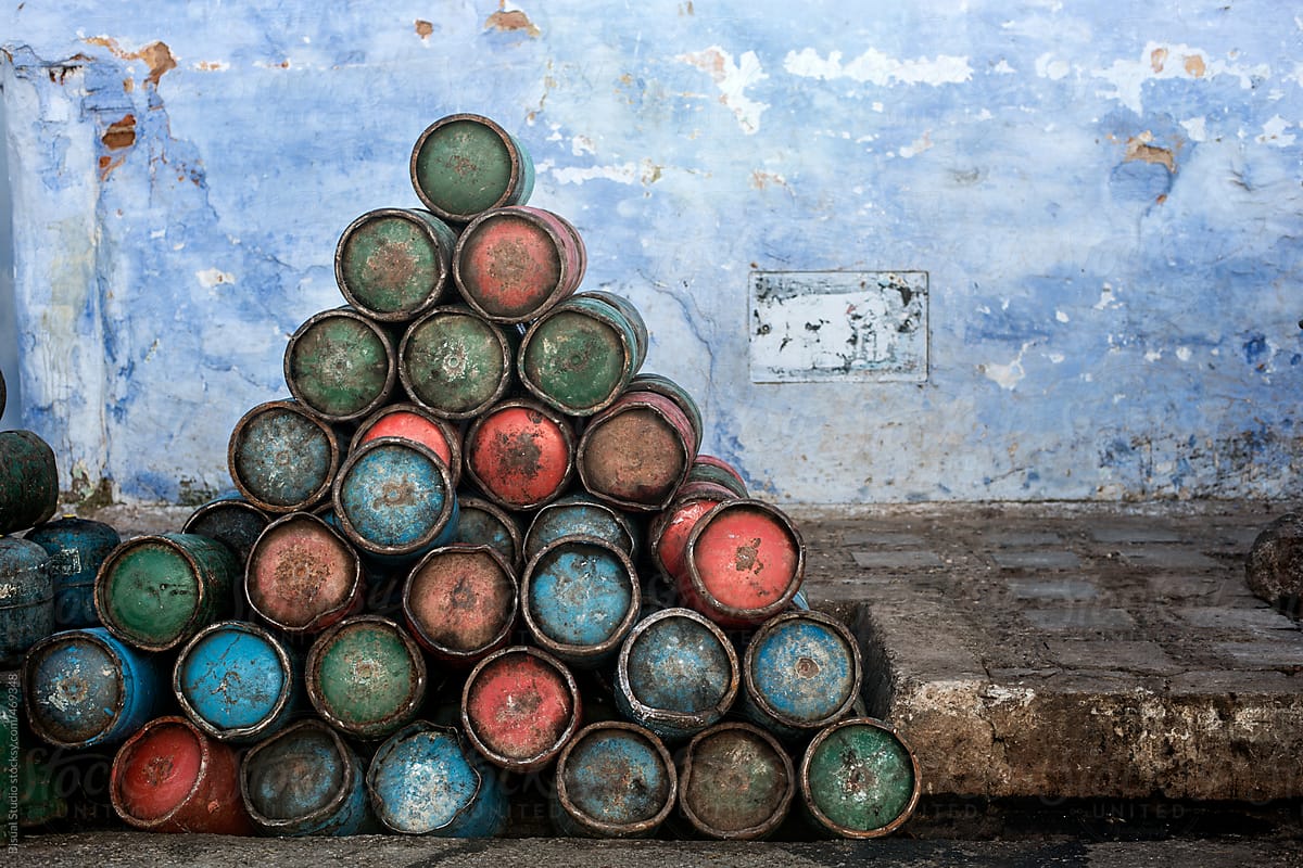 A pyramid of rust petrol barrels