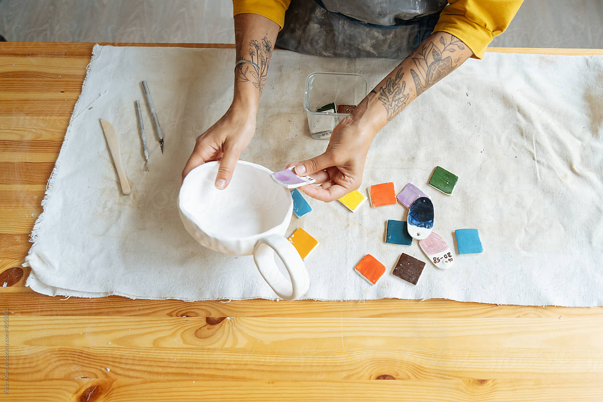 Ceramist woman working at artistic studio