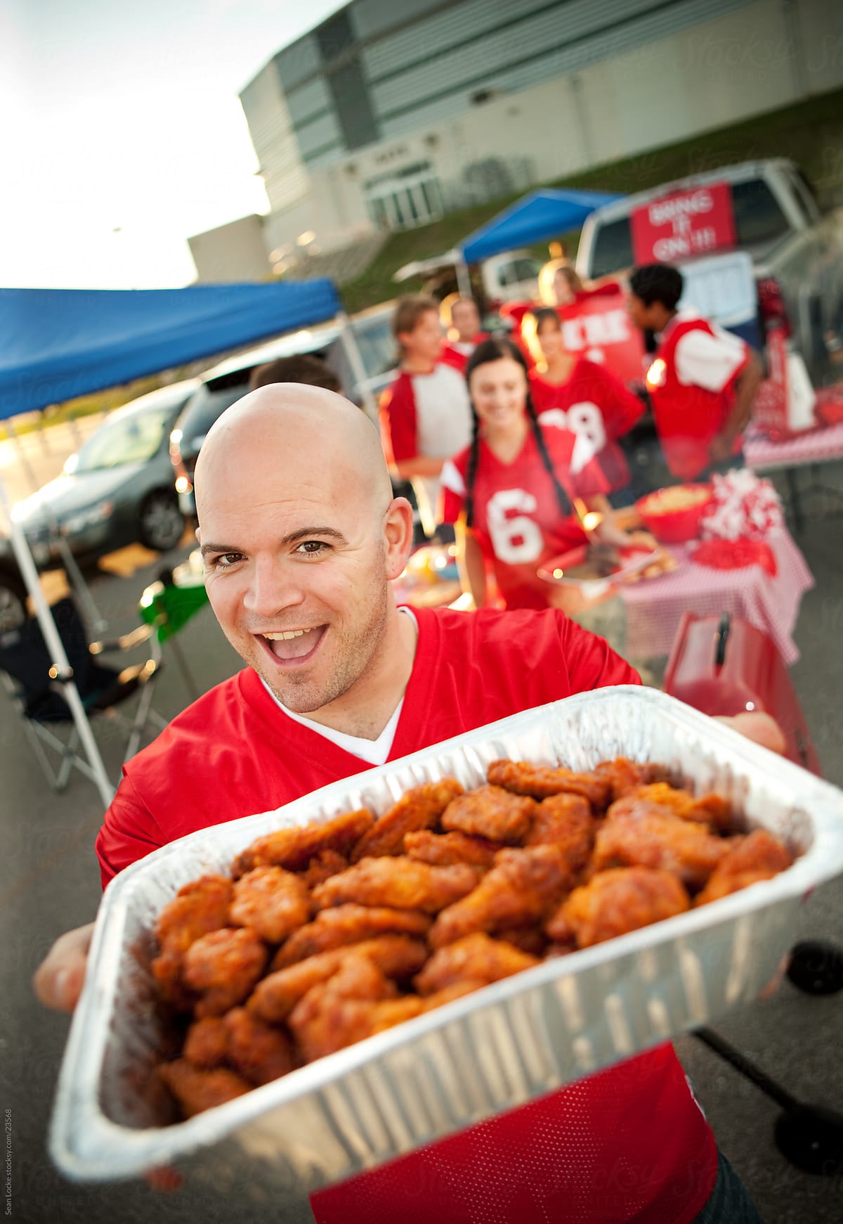 Tailgating: Guy Excited for Buffalo Wings