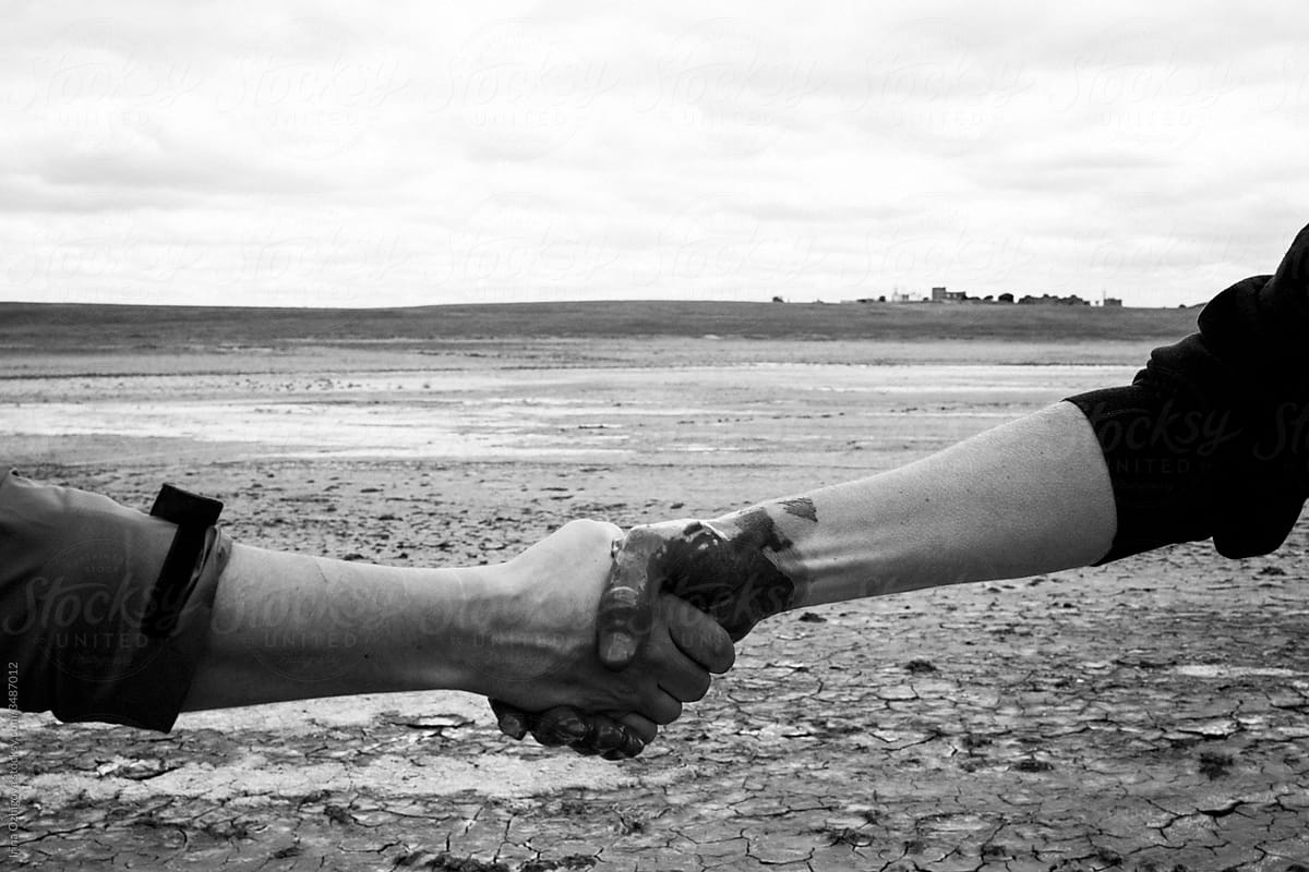 Black and white photo of a handshake