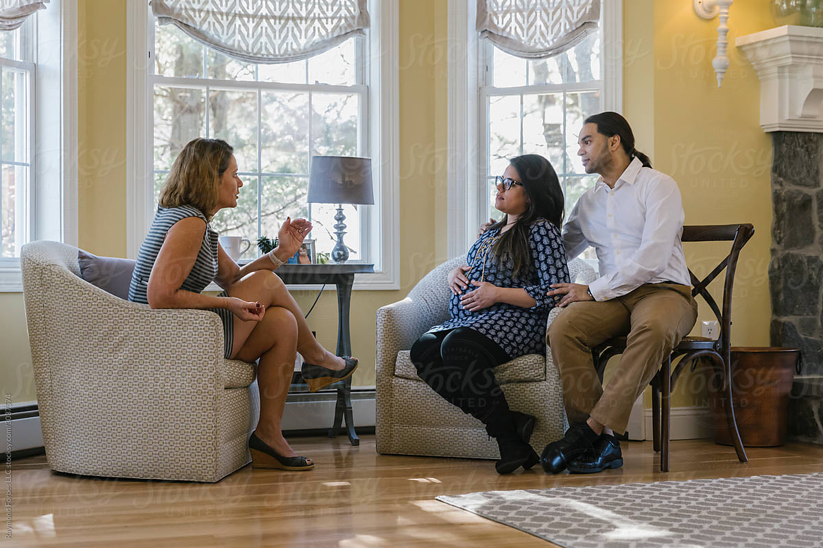 Doula Consulting with Expectant Hispanic Couple at Home