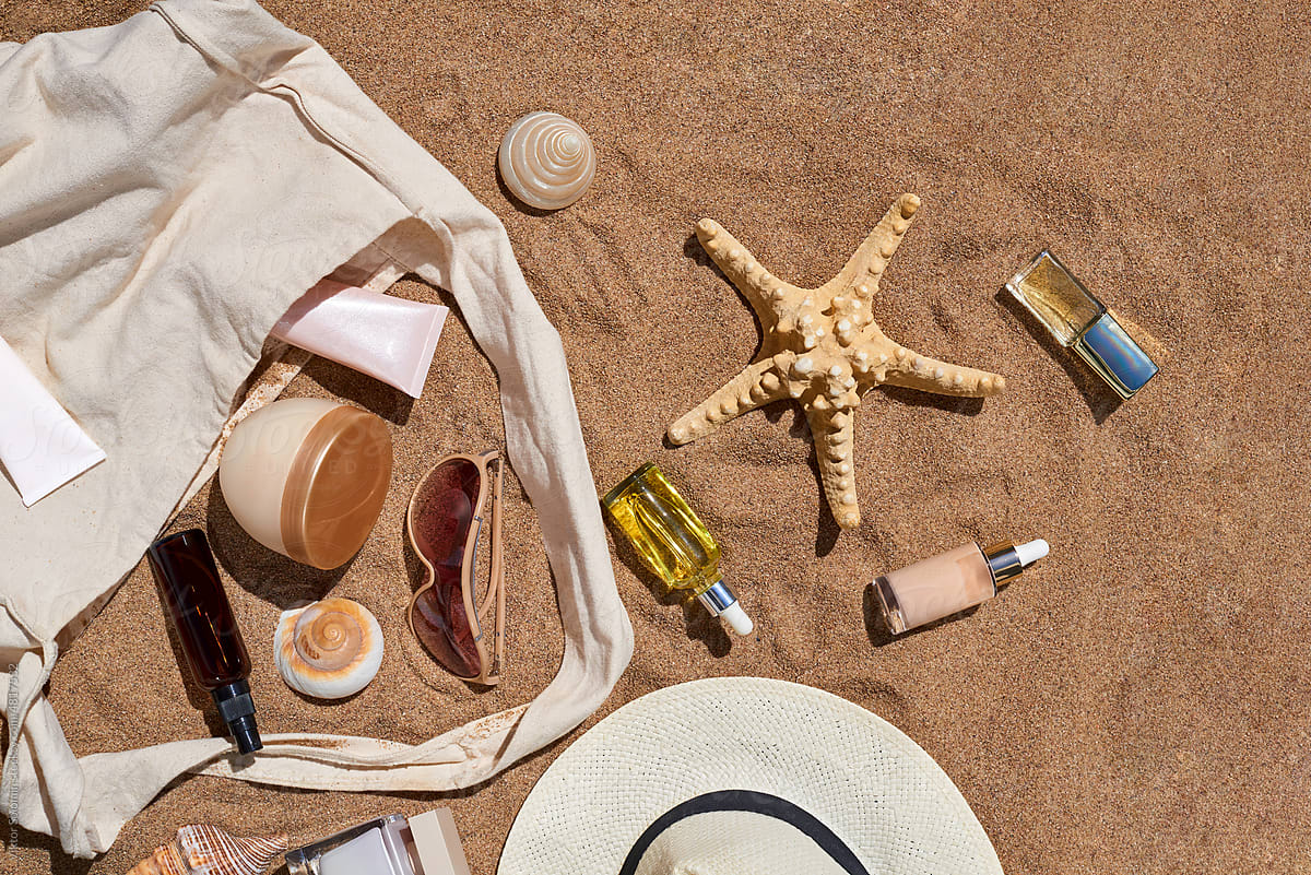 Composition of seashells and starfish, bag and cosmetic products
