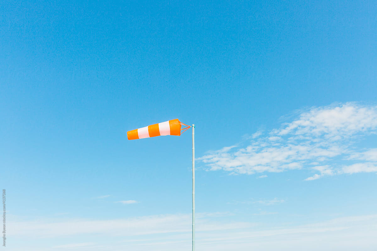 Sky and wind direction flag.