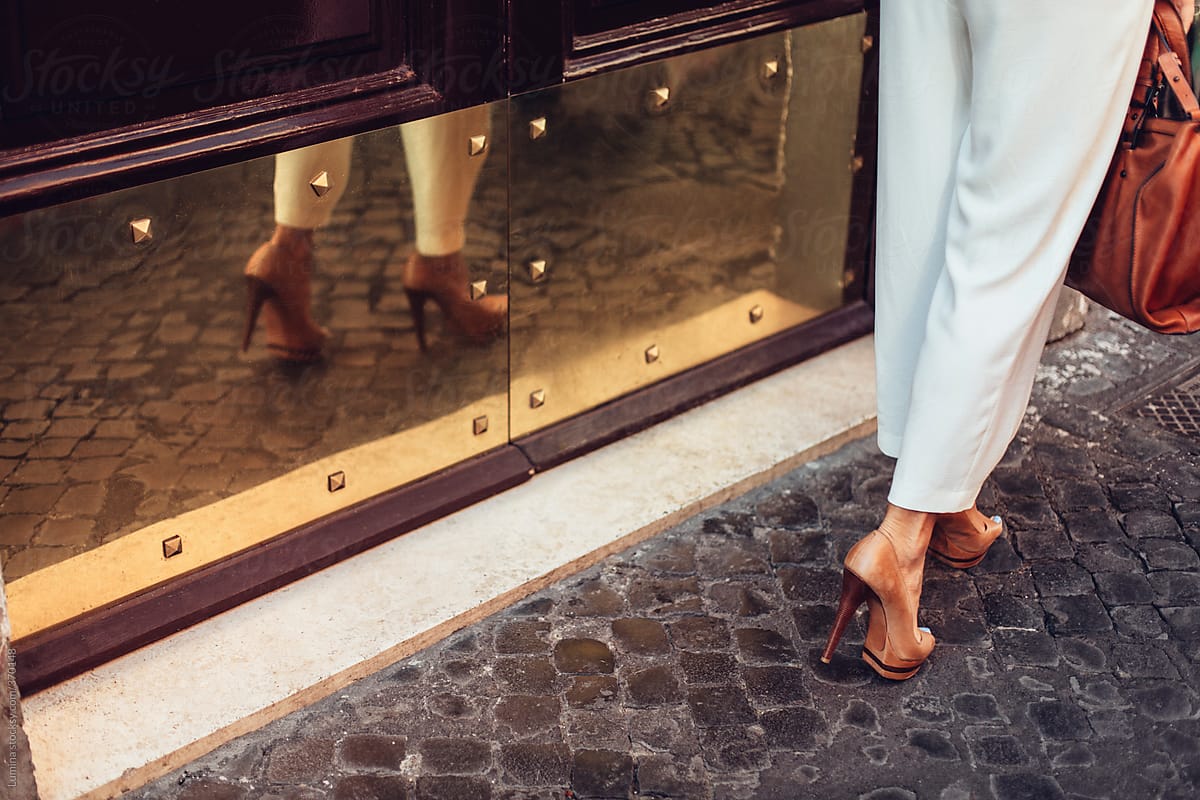 Woman Wearing High Heels on the Street