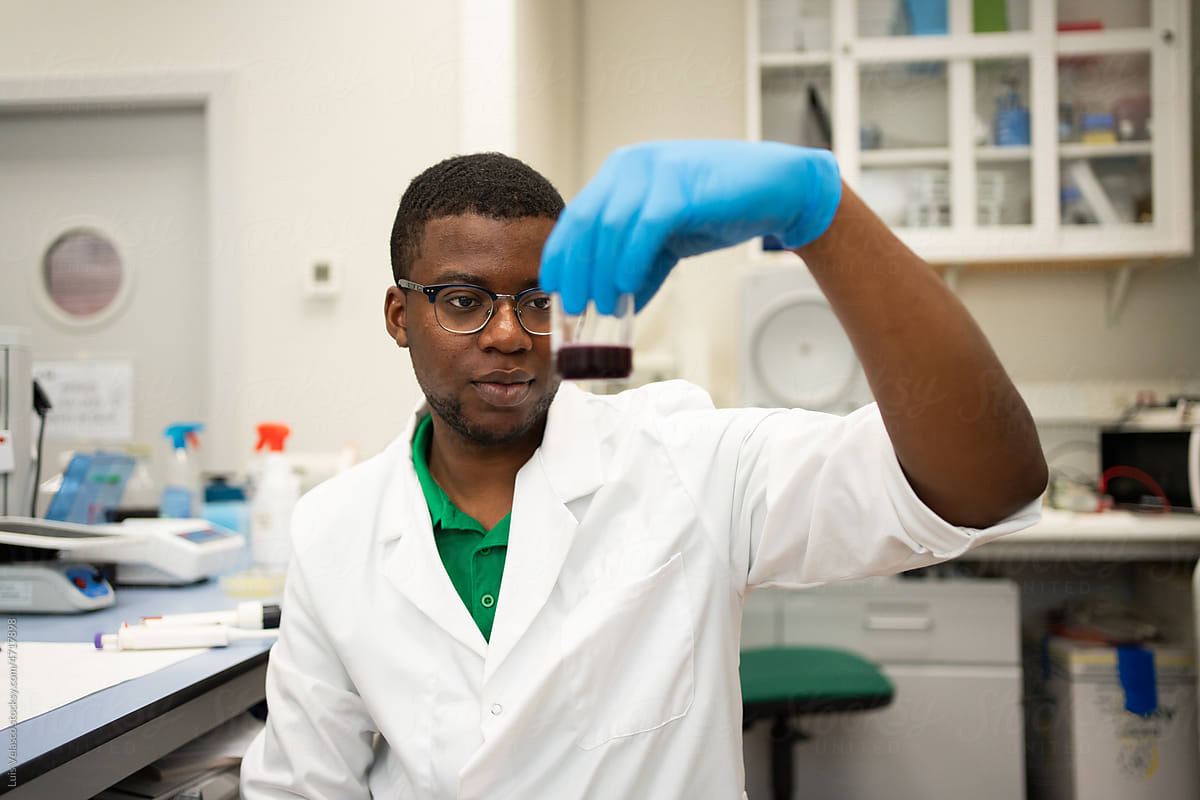 Black Scientist Working In A Science Project In The Lab.
