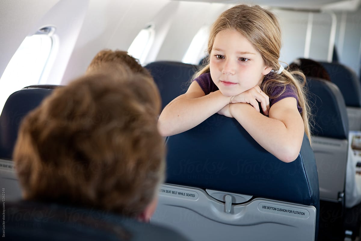 Airplane: Annoying Child Looks Over Seat Back