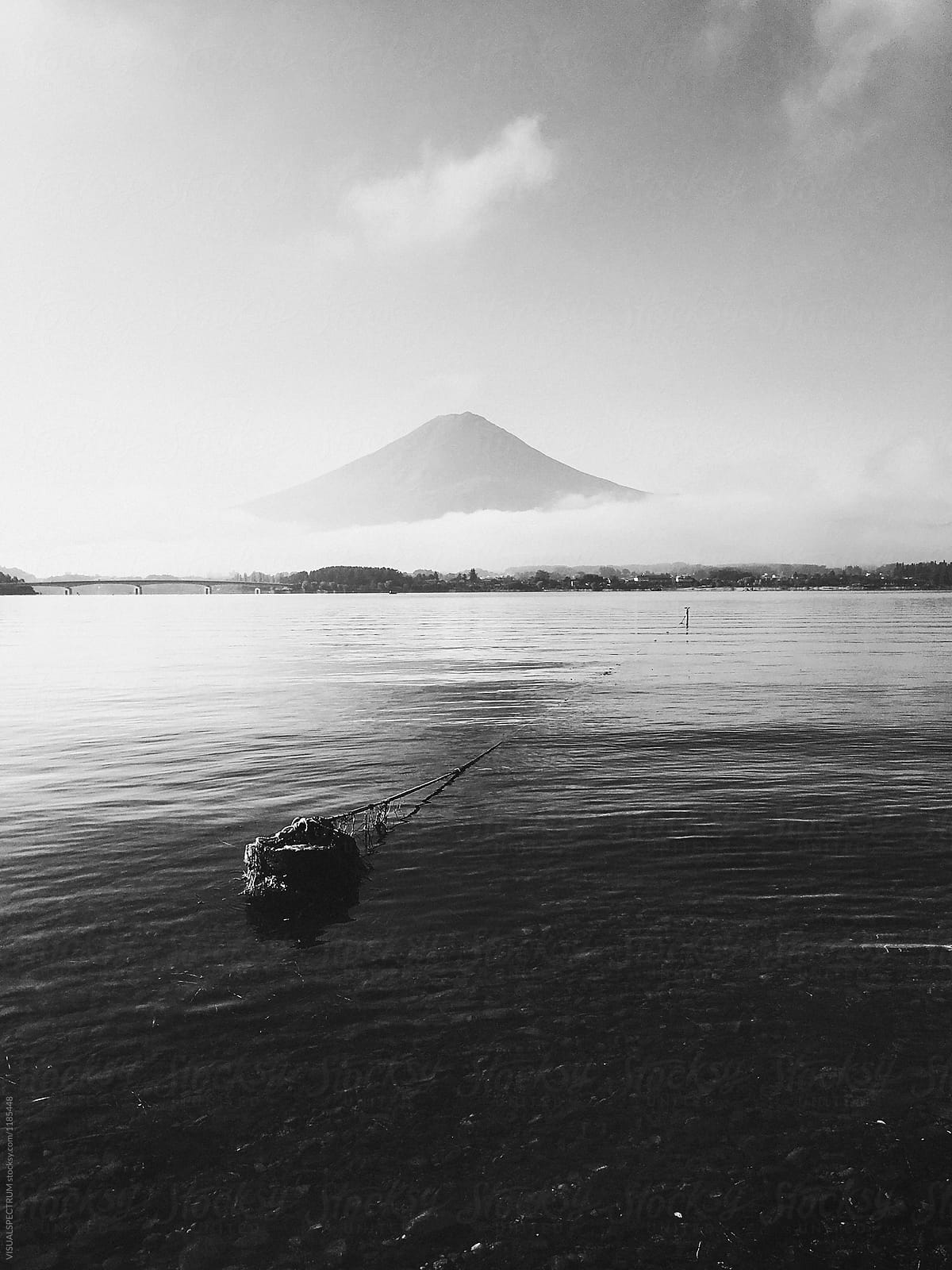 Japan - Lake Kawaguchi With Mount Fuji Surrounded by Clouds in Background
