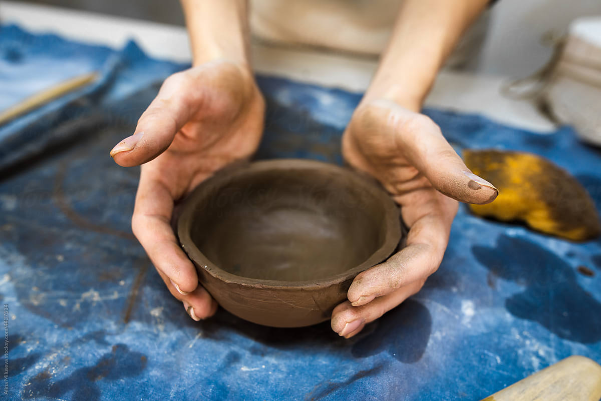 Close Up View Of Woman Hands Holding Fresh Made Bowl