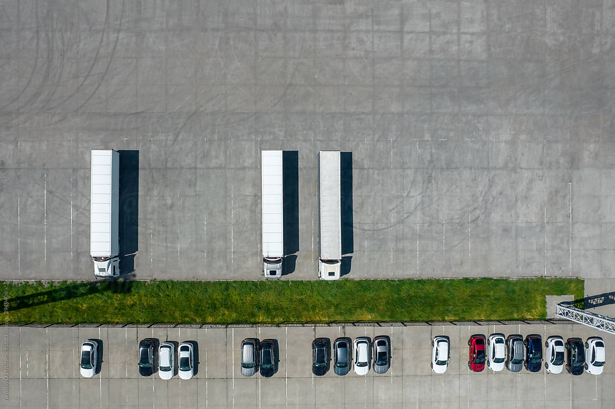Parking lot with places for cargo trucks and passenger cars