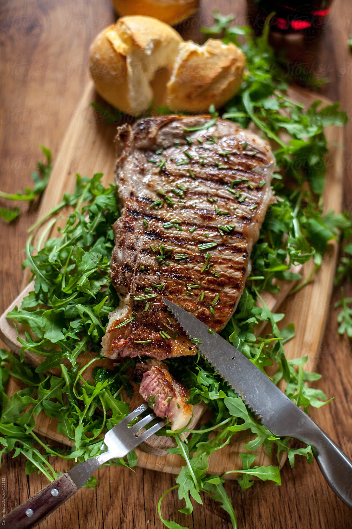 Beef steak with rocket salad