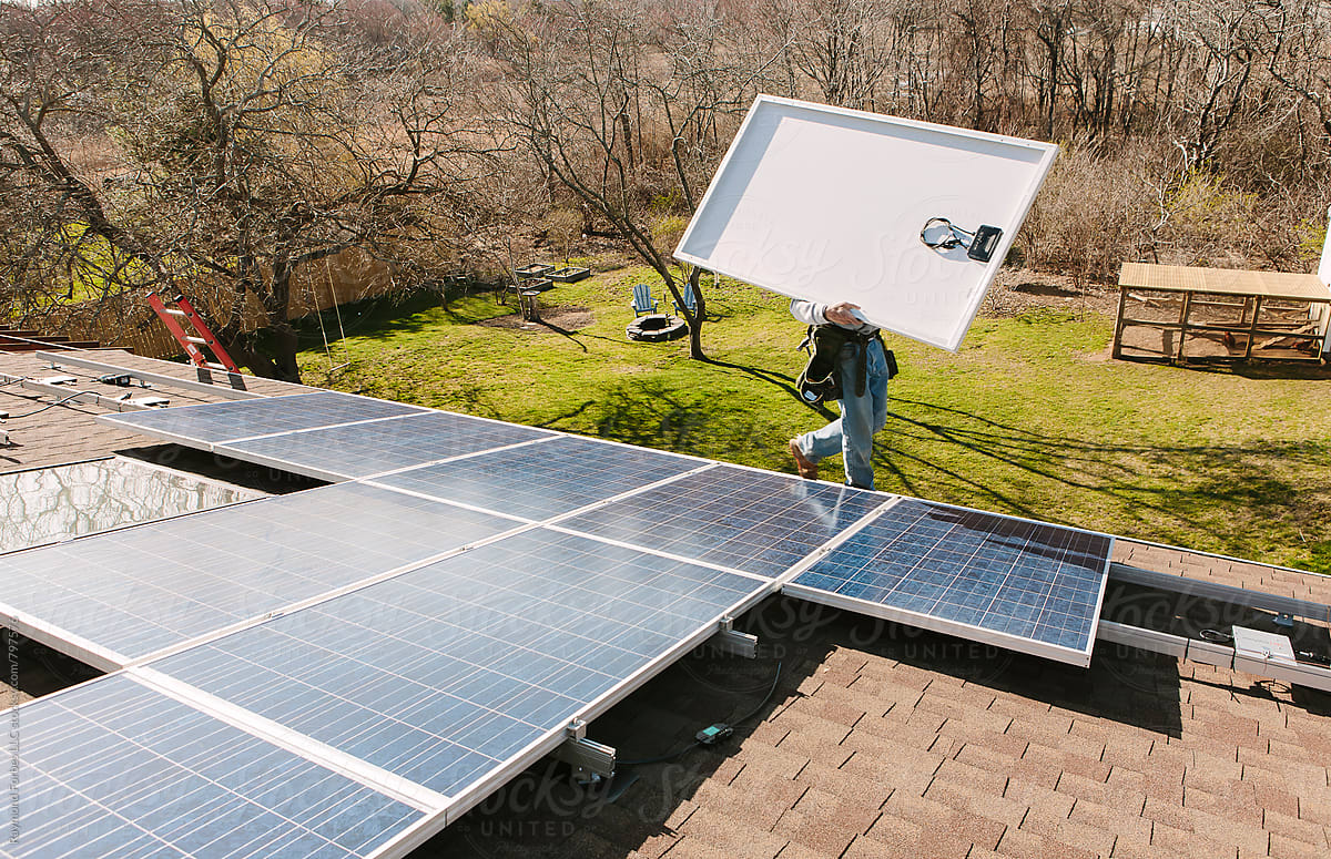 Solar Panel Installation on House on roof