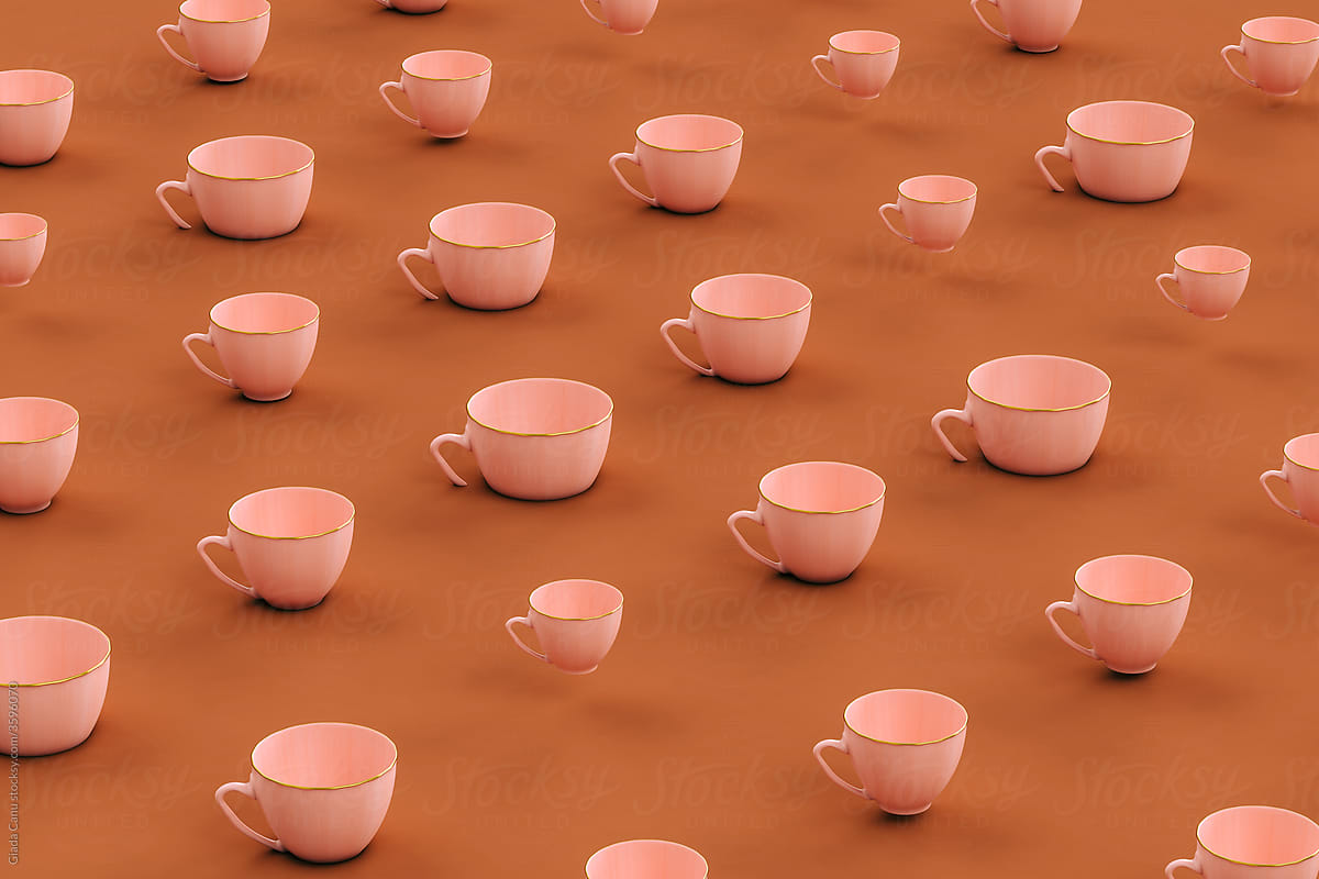 Pink coffee cup in different sizes on brown background