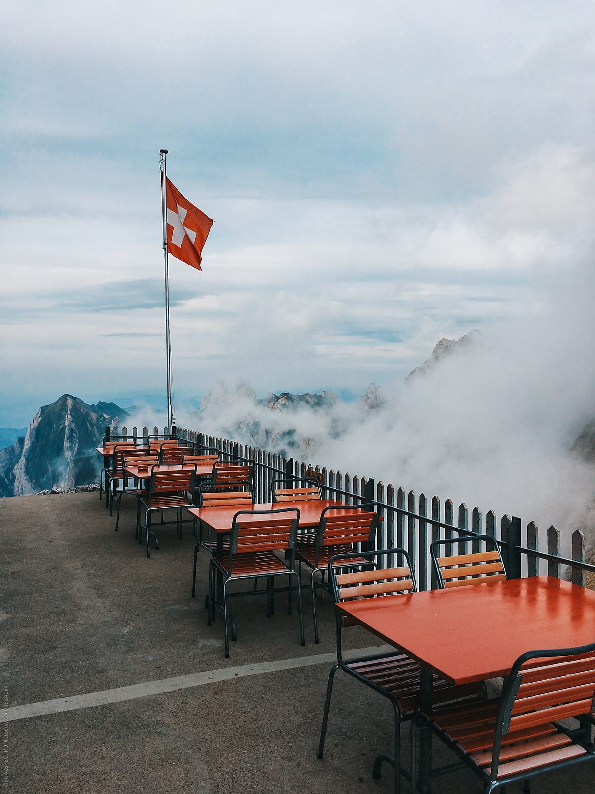 Traditional Mountain Refuge Restaurant in Switzerland on Foggy Summer Day