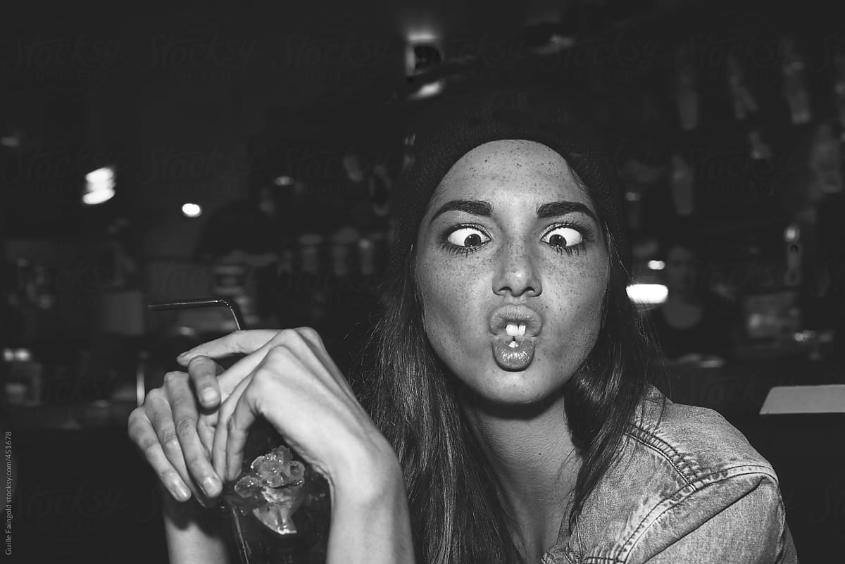 Black and white funny girl in pub