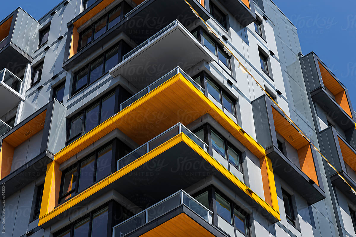 Orange and black buildings form a low perspective