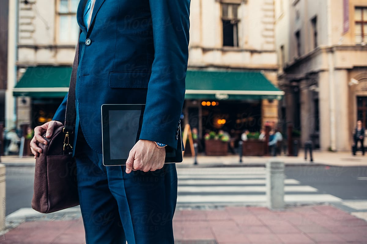 Businessman Holding a Tablet