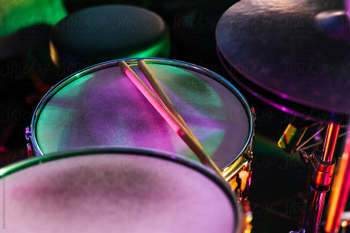 Drums with drumstick in dim light